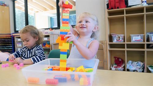 female students with legos