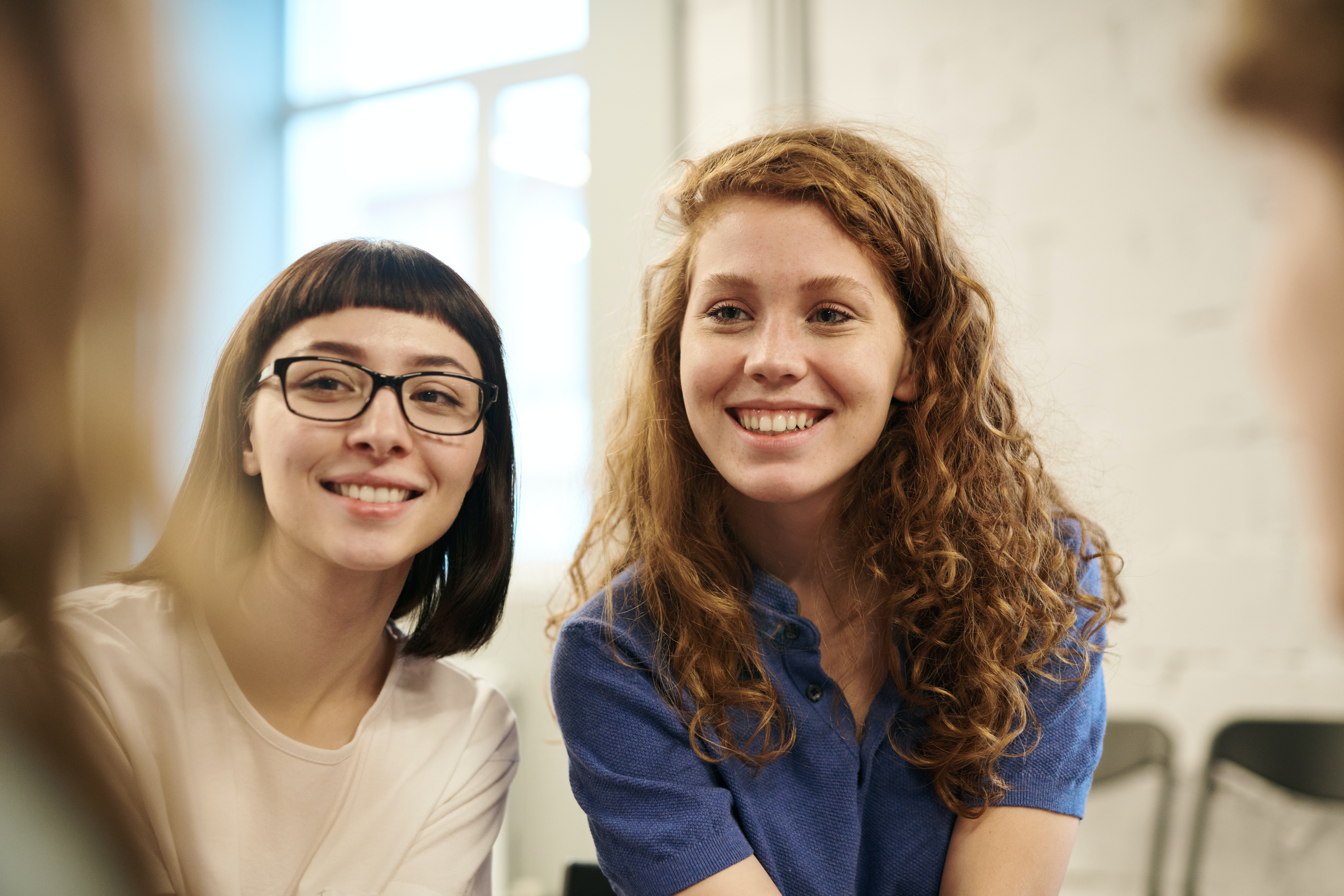 two women smiling